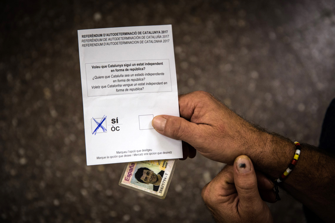Celebration of the illegal referendum of Catalonia the 1th October. People have come to schools early at 5:30 am to keep the police from closing the school before voting starts. Long queues have built up at the door until the school has opened at 9:00 am. The first two hours in the morning there have been many informatic problems with the application to count the votes. People expected frustrated thinking that they could not vote. While in some schools of Barcelona and Sant Julià de Ramis there have been police charges, in Mataró people were voting under the threat of receiving a visit from the Civil Guard or the National Police and closing the schools. The Thos i Codina Institute of Mataró has organized activities in the afternoon to gather people and avoid closure. Finally, in the city of Mataró, no ballot boxes have been requisitioned and the final count has been made, with a 90.1% vote in favor of Catalonia's independence. Photo: Eva Parey/4SEE.