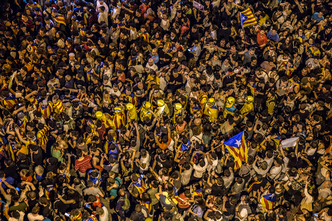 General Strike  3-O against the violence during the Catalan referendum on 1-O. People went in front of the main office of the National Police in Via Laietana Street. The firefighters came to disolve the demonstration pacifically. Barcelona. Photo: Eva Parey